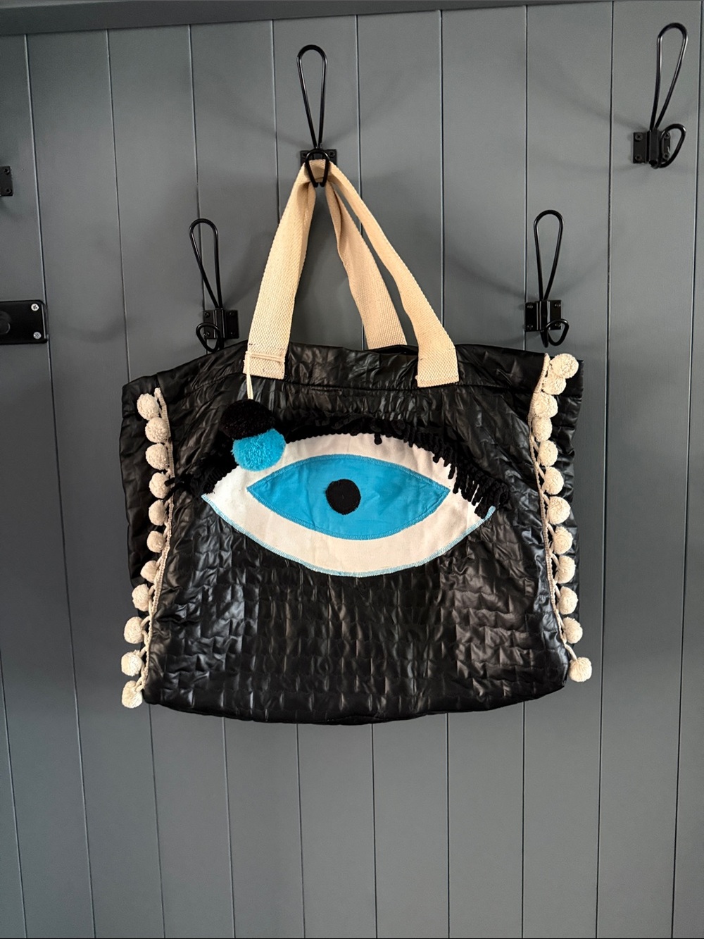 Evil Eye Black Tote Bag with Blue Eye Appliqué and Cream Pom Trim